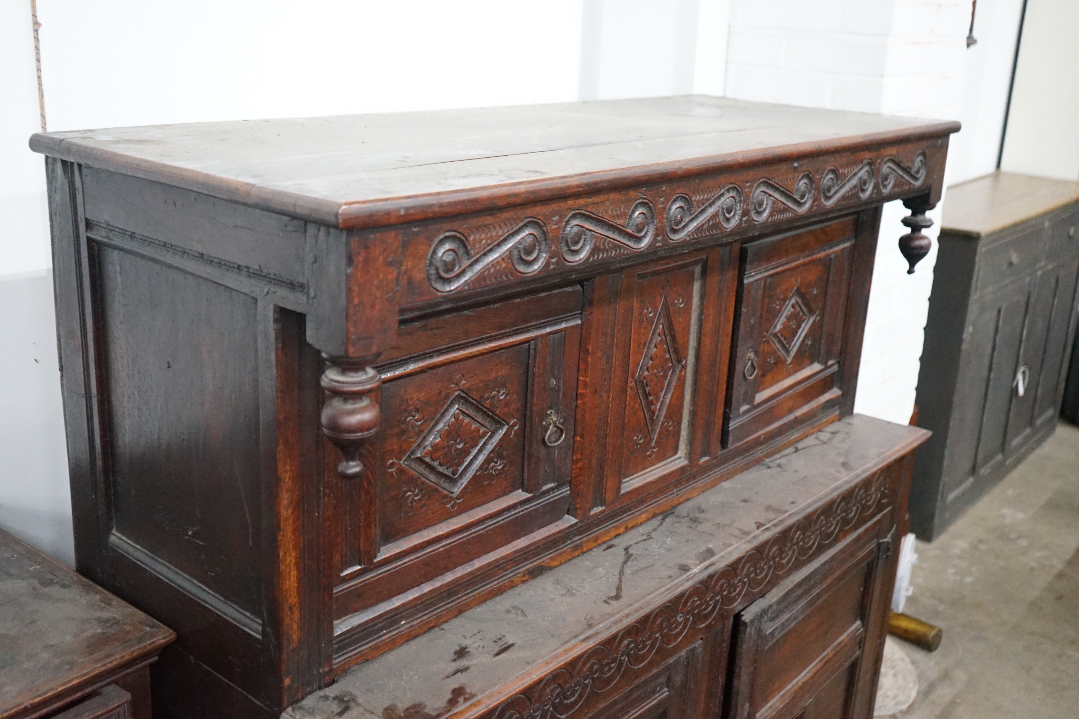 A 17th century oak court cupboard, width 139cm, depth 57cm, height 146cm